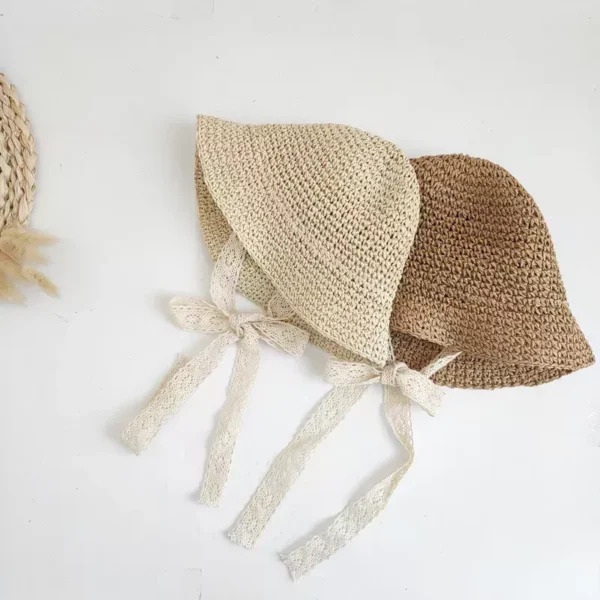 Chic Straw Baby Girl Hat: Elegant Summer Accessory with a Lace Bow Detail